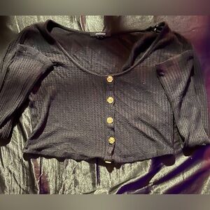 Black cropped sweater.